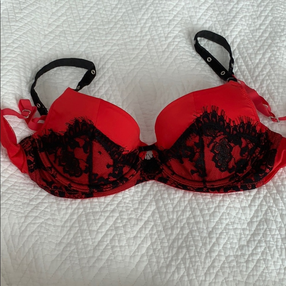 Red and black lace bra